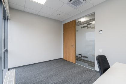 Open-plan workspaces in a business center